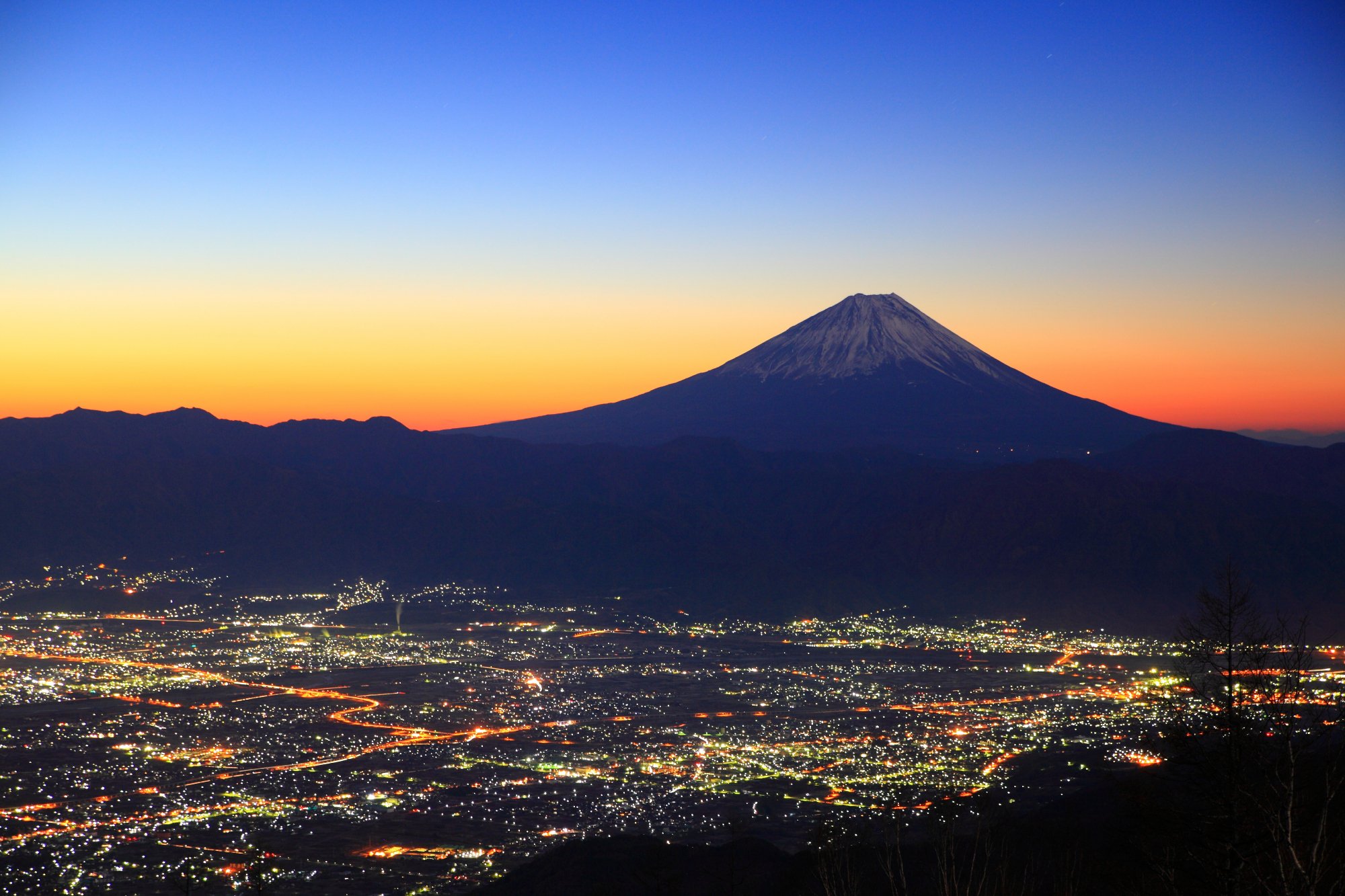 Watch the sun rise over the Kofu basin and the iconic Mount Fuji